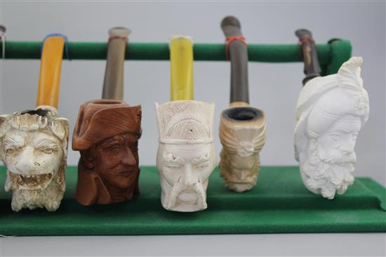 A collection of Meerschaum pipes and cheroot holders,